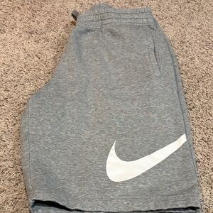 Nike Men's Gray Athletic Shorts with White Swoosh